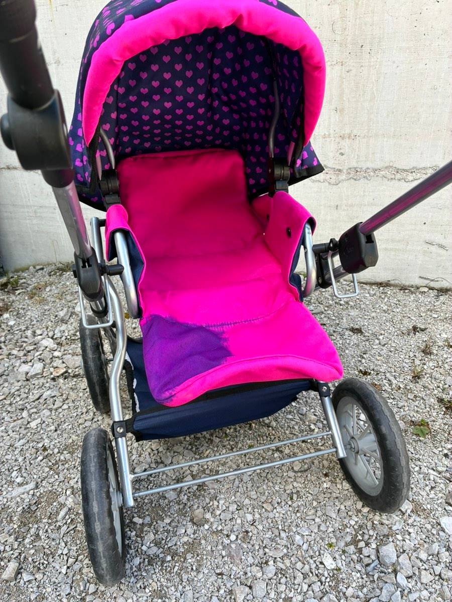 Puppenwagen / Spielzeug-Kinderwagen - pink mit Herzmuster,  15,- (6105  Leutasch) - willhaben