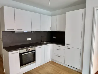 Moderne 2-Zimmer-Neubauwohnung mit Freifläche, Kellerabteil, Fitnessraum und Dachgarten – Bild 3