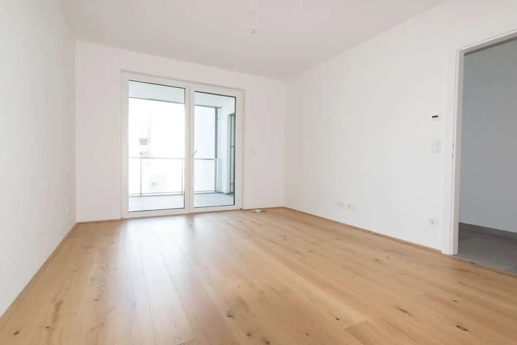 MODERNE 3-ZIMMER-EIGENTUMSWOHNUNG MIT TERRASSE UND LOGGIA, HOCHWERTIGER AUSSTATTUNG UND DURCHDACHTEM GRUNDRISS - Ansicht 3