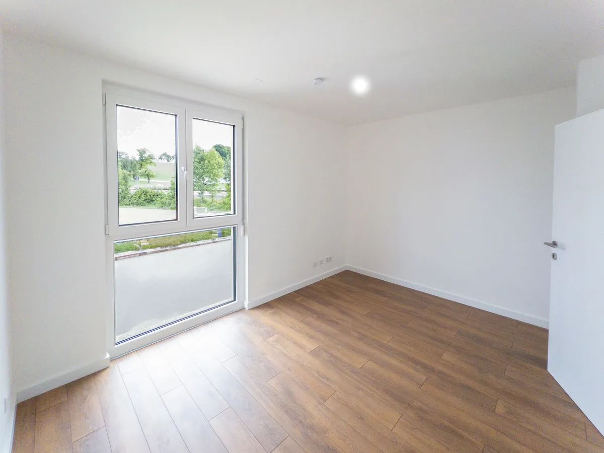 Idyllische 2-Zimmer-Wohnung mit Balkon und eigenem Stellplatz - Ansicht 2