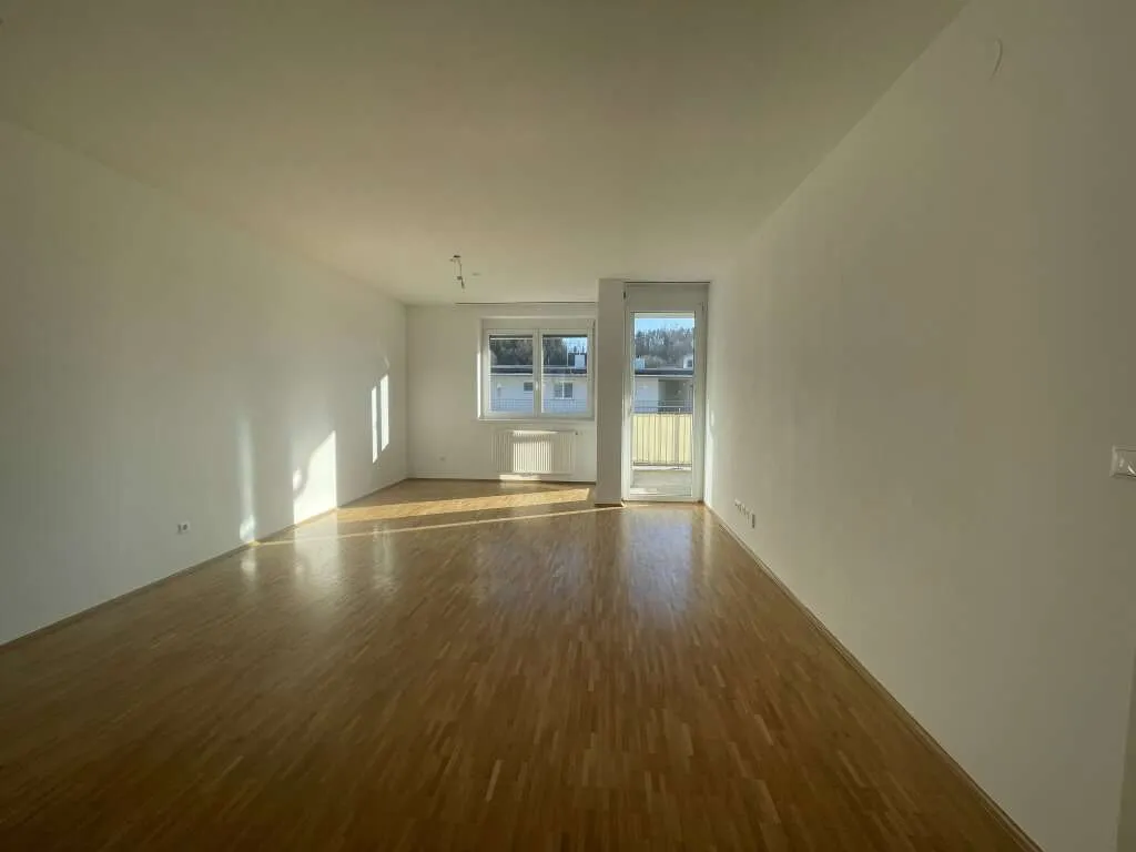 Geförderte Genossenschaftswohnung - Helle 3-Zimmer-Wohnung mit Loggia & Tiefgarage - View 3