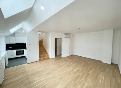 Lichtdurchflutete 2-Zimmer-Maisonettewohnung mit Klimaanlage! – Bild 2