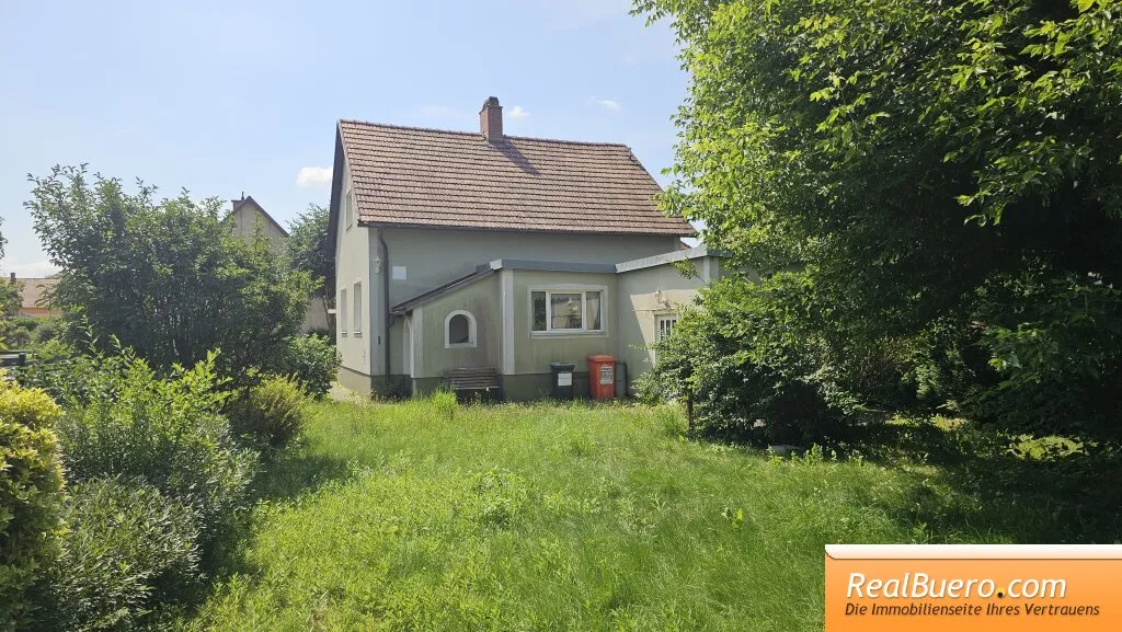 EINFAMILIENHAUS MIT KFZ STELLPLATZ UND GARTEN - Ansicht 3