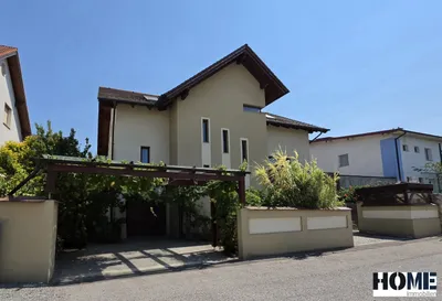 7-Zimmer-Haus kaufen in Bruck an der Leitha – 323 m², € 749.900 – Bild 1 von 60