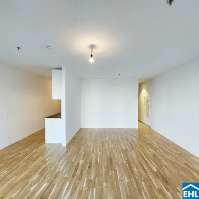 Sonnwendviertel: 1-Zimmer-Wohnung mit Balkon im 16. OG - Fitnessraum, Co-Working & Rooftop-Terrasse inklusive! – Bild 2