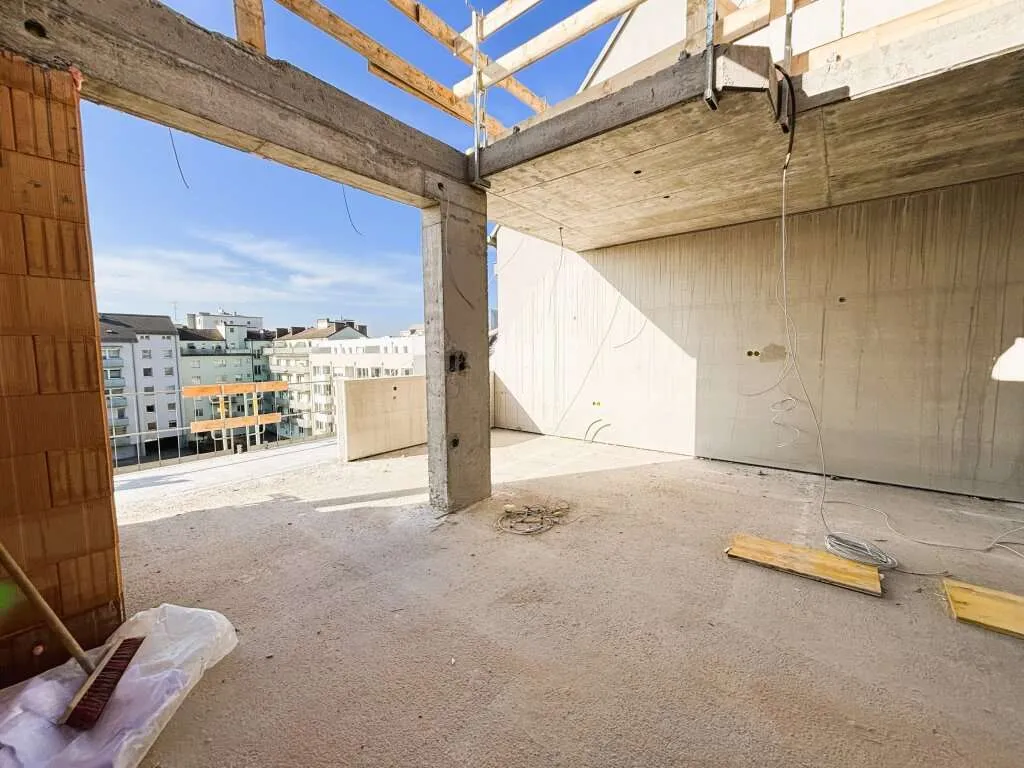 Neubau-Dachgeschoss-Wohnung mit Empore über den Dächern von Linz! - Ansicht 2