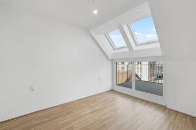 Moderne Erstbezug-Mietwohnungen mit privaten Freiflächen und Garage im 21. Bezirk – Bild 2