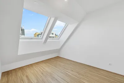 Moderne Erstbezug-Mietwohnungen mit privaten Freiflächen und Garage im 21. Bezirk – Bild 3