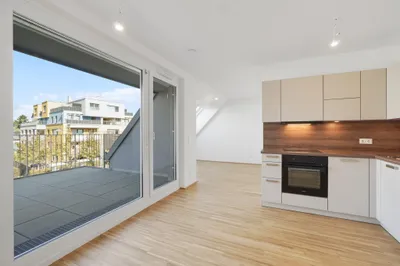 Moderne Erstbezug-Mietwohnungen mit privaten Freiflächen und Garage im 21. Bezirk