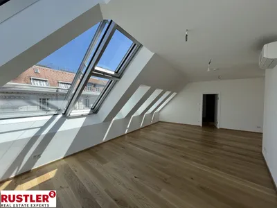 Erstbezugs-Dachgeschosswohnung in zentraler Lage – Bild 2