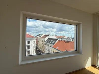 2-Zimmer-Dachgeschossneubau mit Klimaanlage & Panoramafenster – Bild 2