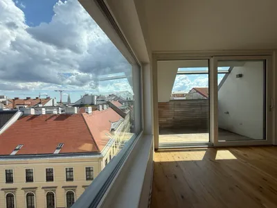2-Zimmer-Dachgeschossneubau mit Klimaanlage & Panoramafenster – Bild 3
