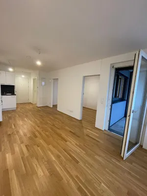 Ab 1.7. - Moderne 1-1/2-Zimmer-Singlewohnung mit nordseitiger Loggia im 7. Stock am Genochplatz – Bild 2