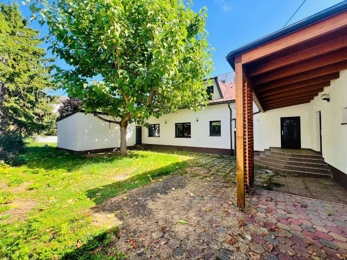 Mehrfamilienhaus mit Garten - Ansicht 2