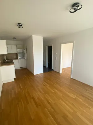 Moderne 2-Zimmer-Wohnung mit 10 m² Terrasse & Einbauküche in 1220 Wien – Bild 2