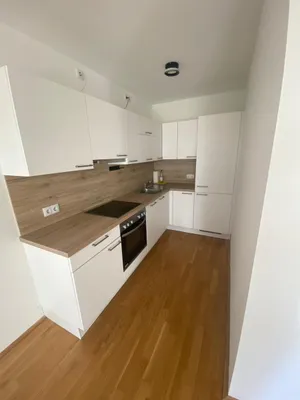 Moderne 2-Zimmer-Wohnung mit 10 m² Terrasse & Einbauküche in 1220 Wien – Bild 3