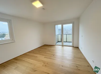Helle DG-Wohnung mit Terrasse | Nur 1 Min. zur U3