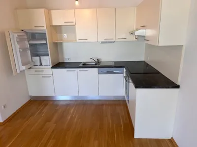 2-Zimmer-Wohnung Neubau inkl Komplettküche, Balkon Außenflächen und Kellerabteil - Kagraner Platz U1 vor der Türe / Aussicht Wiener Hausberge /