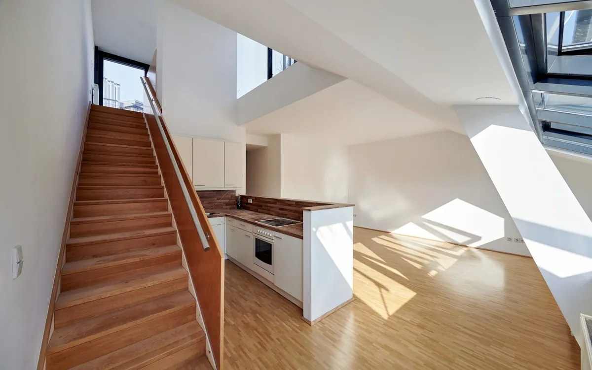 Hoch hinaus ins Wohnglück - Exklusive 2-Zimmer-Maisonette mit Galerie und großer Terrasse - Ansicht 3