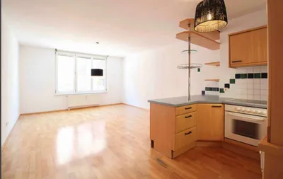 Charmante und helle 1-Zimmer-Wohnung mit Tiefgaragenplatz – Bild 2