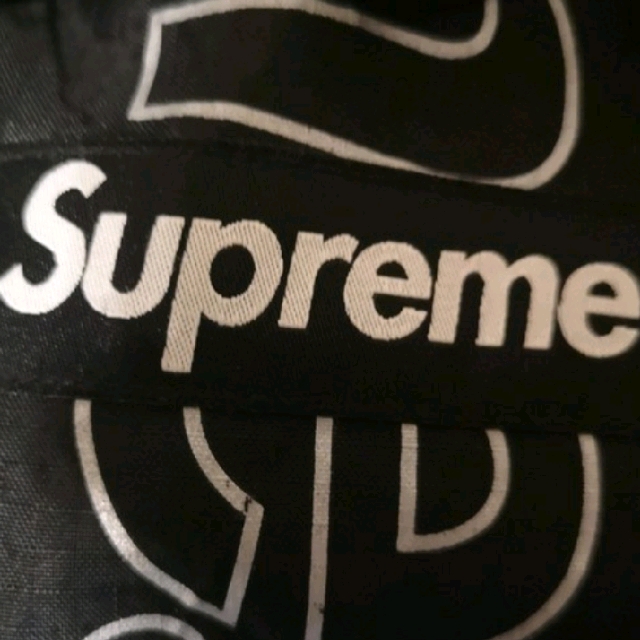 J.