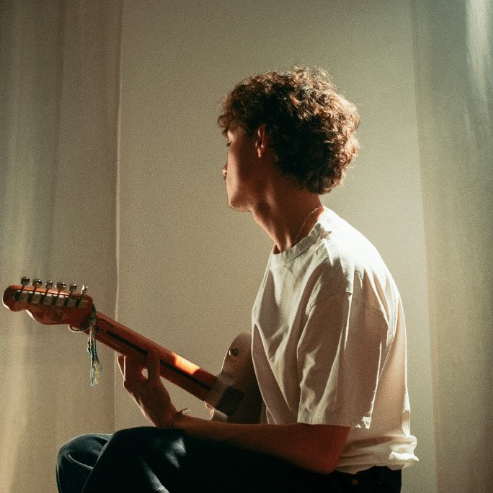 J.