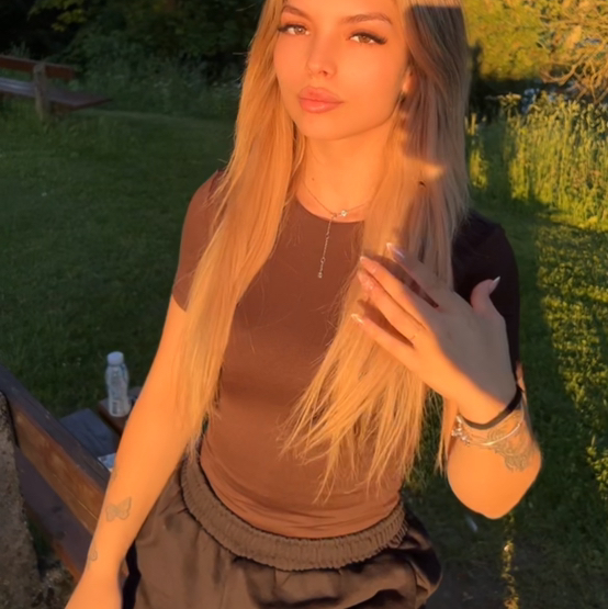 L.